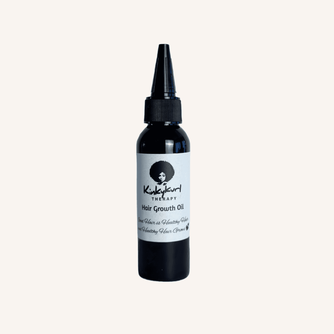 Hair Growth Oil bottle with applicator tip from Knight & Curl Therapy, ideal for strengthening hair and nourishing scalp with Amla oil and powder.